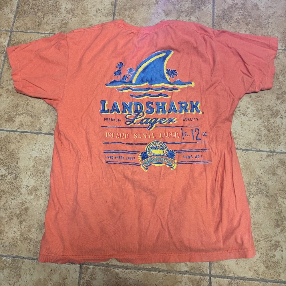 Orange/peach color shirt